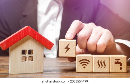 House With Home Service Utilities Blocks. Installation Of Communications And Conclusion Of Contracts With Supply Companies. Electricity, Water And Gas. Internet Services. Connecting To City Network