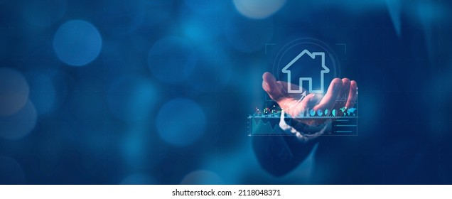 House icon on the hand, mortgage loan home and insurance real property mortgage concept. - Shutterstock ID 2118048371