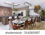 House interior.large dining table in a luxurious house.
