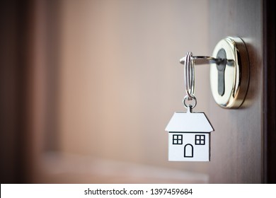 House key in the door. Close up

 - Powered by Shutterstock