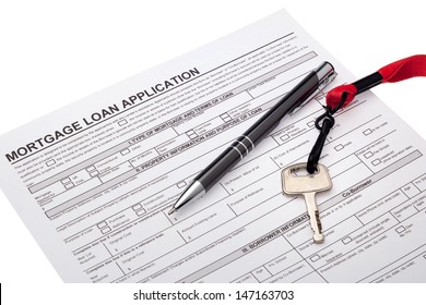 House key with mortgage loan application