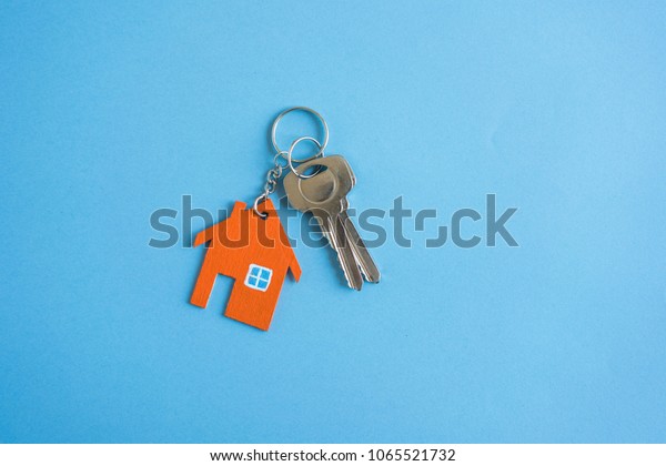 House Key On Blue Background Minimal Stock Photo (Edit Now) 1065521732