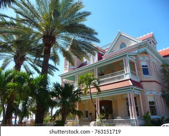 House In Key West, Florida With Giant Palm Trees