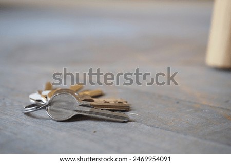 house keys on the ring on table in a room. To forget keys at home concept ,