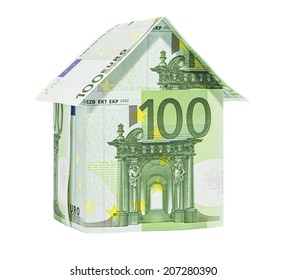 The house made of 100 Euro banknotes, isolated on white.
