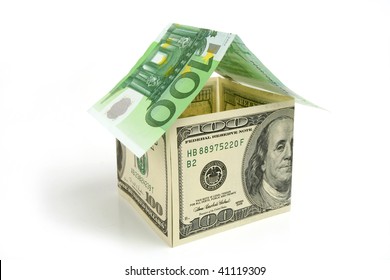 House made from dollor  and euro  bills on white  background