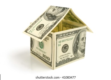 House made from hundred dollor  bills on white  background