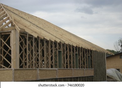 The House Is Made Of A Light Adobe. Frame-adobe Technology. Filling Under Formwork. Fasade. Roof