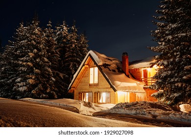 A house in the middle of the forest at winter. - Powered by Shutterstock