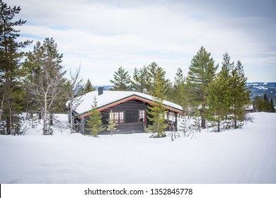 House in the middle of the snow. Cabin in Trysil - skiing area in Norway.