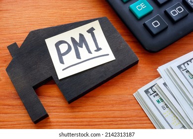 House Model And Memo Stick With Letters PMI Private Mortgage Insurance.