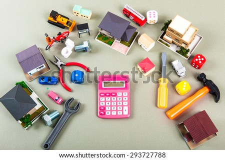 House model and a lot of objects, pink calculator