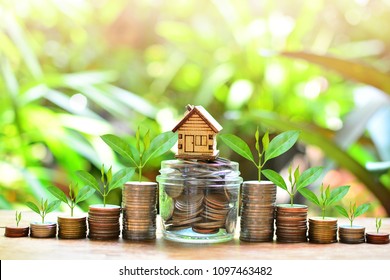 House Model On Coins Saving For Concept Investment Mortgage Fund Finance And Interest Rate Home Loan 