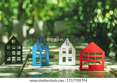 house model in saving plan for residence of people in society, purchasing home for living the real estate investment in business.