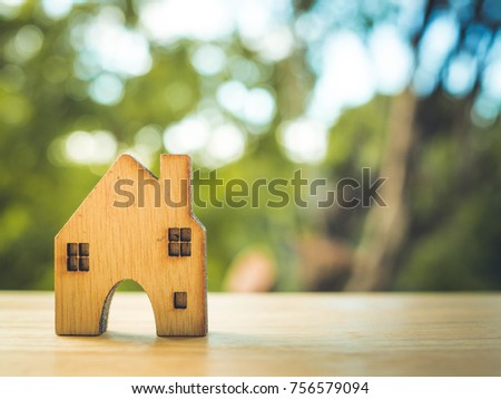 house model in saving plan for residence of people in society, purchasing home for living of dream of community lives.
