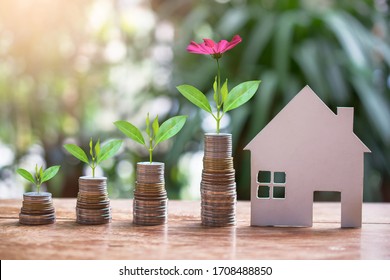 house model set with money coins saving for concept investment mortgage fund finance and refinance home loan - Shutterstock ID 1708488850