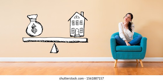 House and money on the scale with woman in a thoughtful pose in a chair
