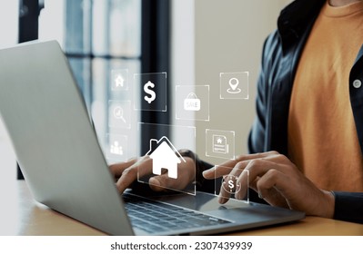 House mortgage loan concept. Businessman using laptop for property sales listings, realtor agency contractor, residential property, investment. - Shutterstock ID 2307439939