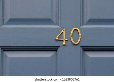 House number 40 on a blue wooden front door