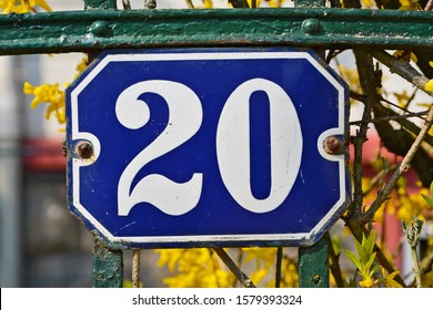 A House Number Plaque, Showing The Number Twenty (20)