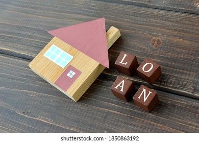House object and wooden blocks with loan word - Shutterstock ID 1850863192