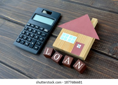 House object and wooden blocks with loan word - Shutterstock ID 1877686681