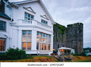 House And Old Tower In Brecon Town In Brecon Beacons National Park In South Wales In United Kingdom.