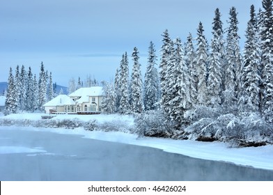 House On An Alaska River In Winter