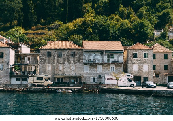 A house on wheels. Tourists travel to Montenegro\
in houses on wheels