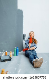 House painter sitting on the floor after work - Shutterstock ID 1625807758