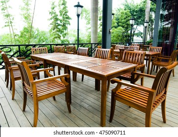 House Patio With Wooden Patio Furniture