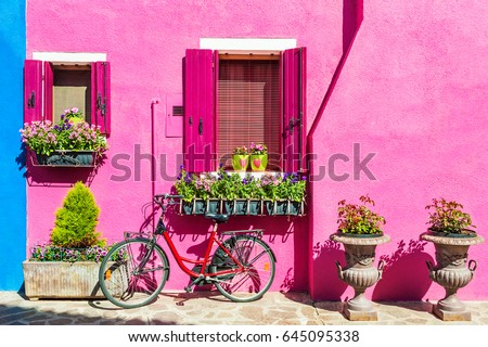 House with pink wall. Colorful houses in Burano island near Venice, Italy