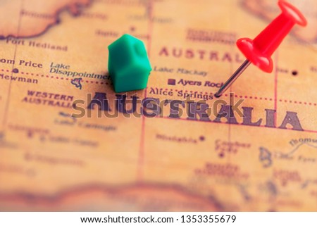 House and pushpin on Australia part of world map. Real estate in Australia concept.