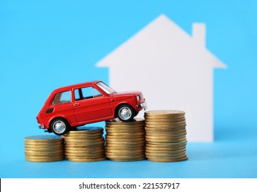 House, Red Miniature Car And Money