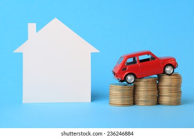 House, Red Miniature Car And Money