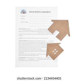 House Rental Agreement And Wooden Figures Of Houses On White Background