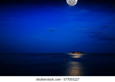 House Of The Rising Full Moon In Sea Weed Farm, Sabah. Malaysia