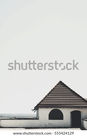 Roofs against the evening sky