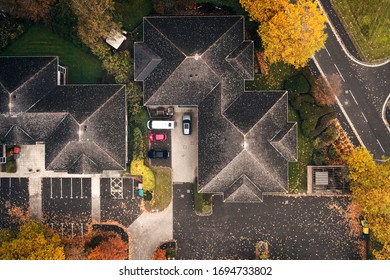 House Roof Tops At Hazy Autumnal Morning In United Kingdom - Top Down Drone Point Of View