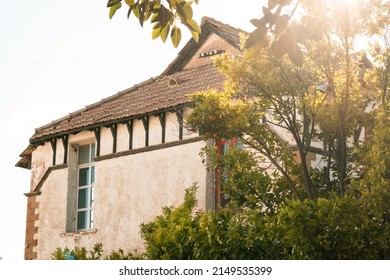 House Roof From The Working Class Neighborhood In Huelva (Spain) With Golden Light During Sunset