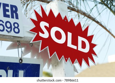 House For Sale And Sold Sign