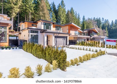 House For Sale In Vancouver, Canada. Real Estate Sign In Front Of A House.