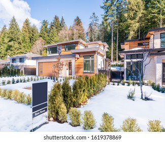 House For Sale In Vancouver, Canada. Real Estate Sign In Front Of A House.