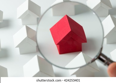 House Searching Concept With A Magnifying Glass