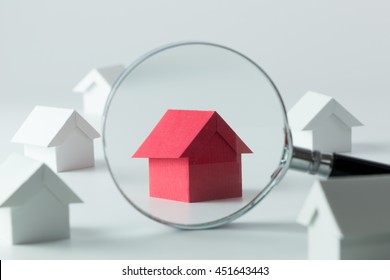 House Searching Concept With A Magnifying Glass