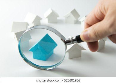 House Searching Concept With A Magnifying Glass