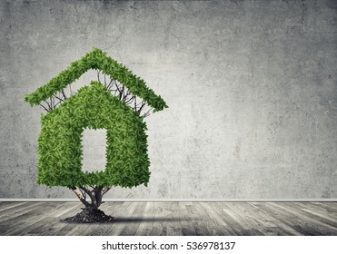 House shaped green tree as real estate concept