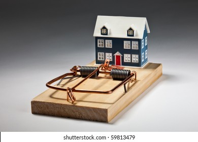 House Sitting On Large Mouse Trap - Luring Investors And Home Owners