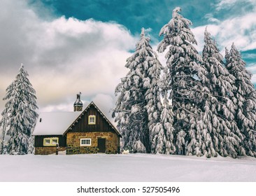 House In Snow