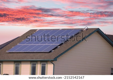 A House with a Solar Panel system during afternoon